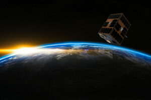 Photo of the Speqtre satellite in orbit above the Earth